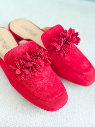 Corkys Just A Sip red suede mule slides with decorative floral embellishment on toe