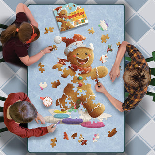 Three children assembling I Am Lil' Gingerbread Man 100-piece shaped puzzle on table