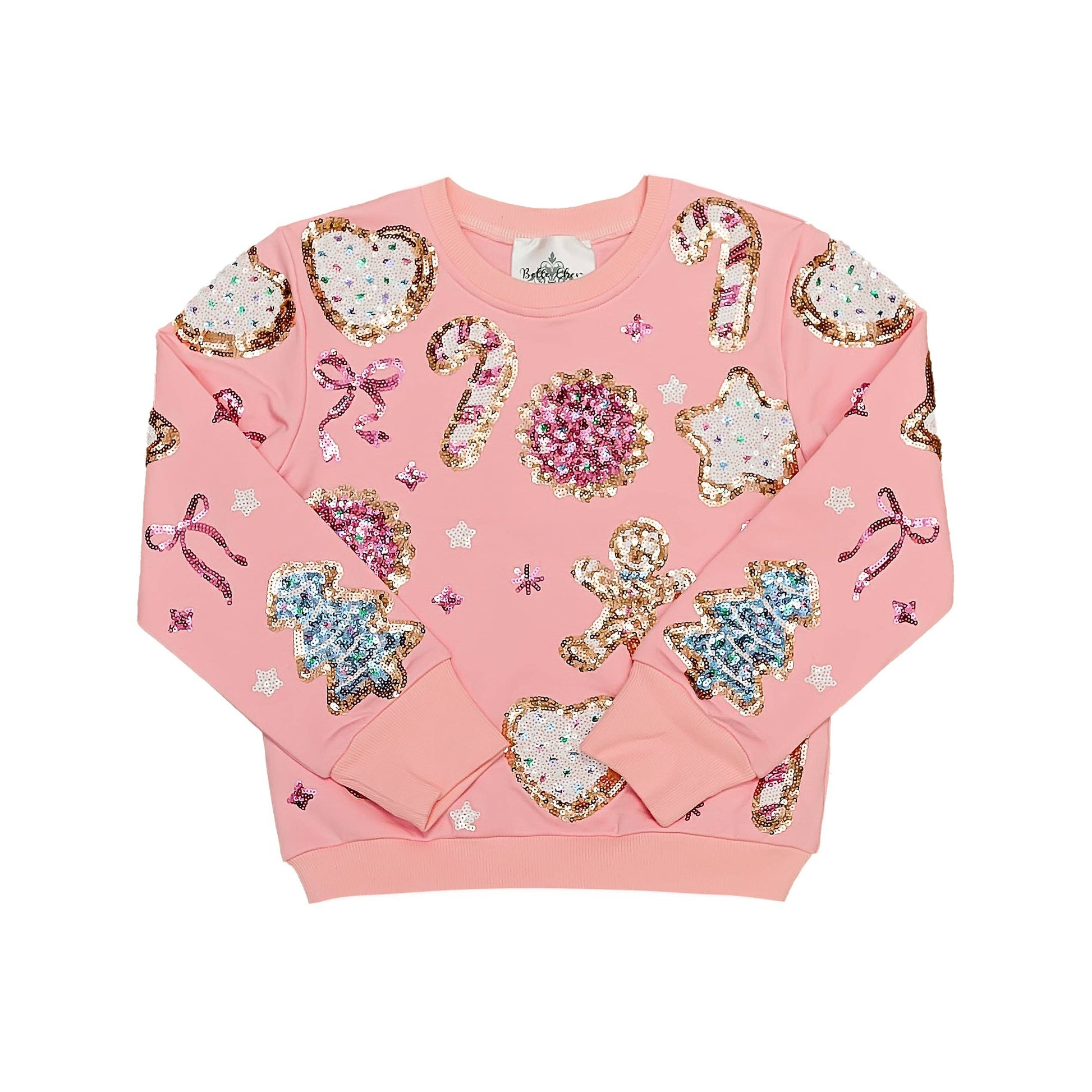 Pink sweatshirt with festive cookie patterns on a white background