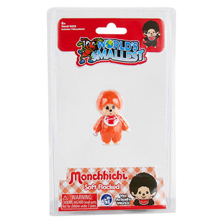 World's Smallest Monchhichi orange monkey toy in clear retail packaging