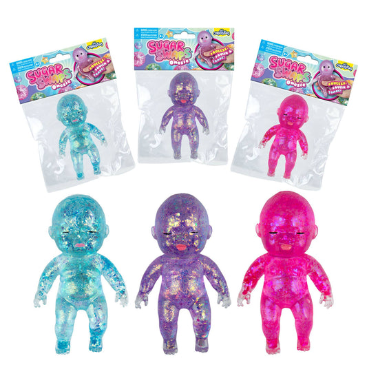 Three colorful baby dolls in packaging on a white background