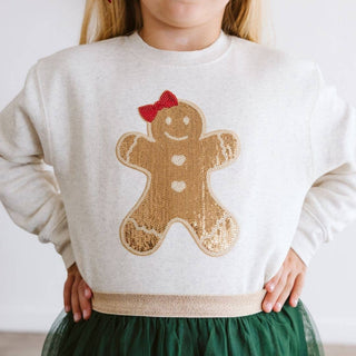 Girls cream sweatshirt with sequin gingerbread girl patch and red bow