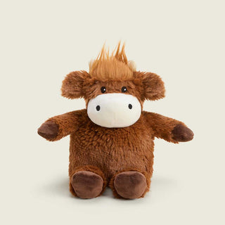 Warmies Highland Cow plush stuffed animal with fluffy brown fur and orange hair tuft