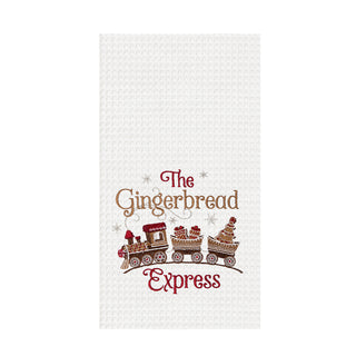 White waffle weave kitchen towel with embroidered gingerbread train and snowflakes
