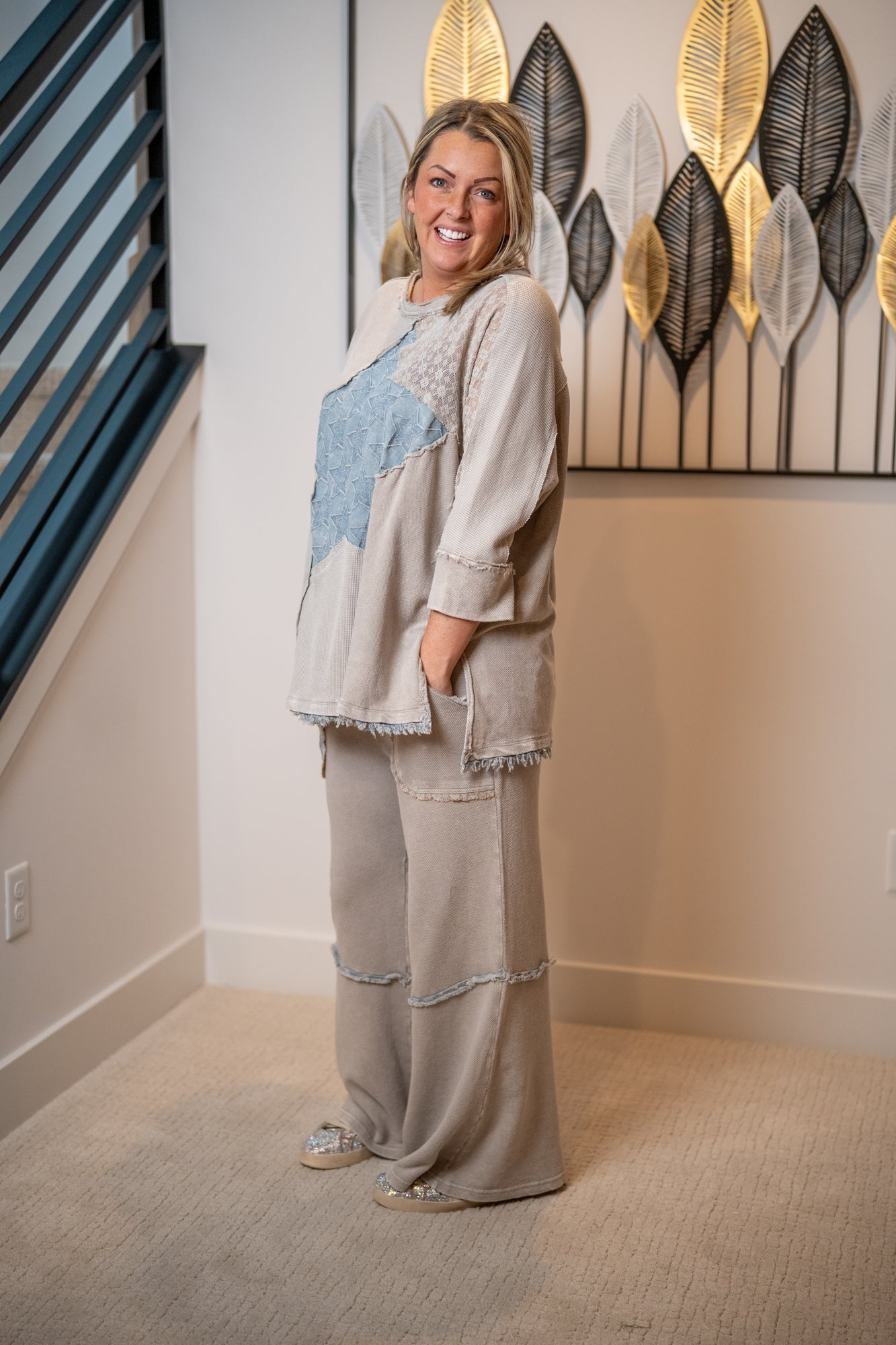 matching easel  terry pants relaxed fit, drawstring waist, and distressed details