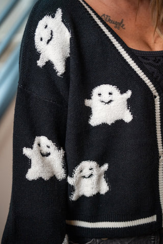 Black knit cardigan with white fuzzy ghost pattern and stripe trim detail