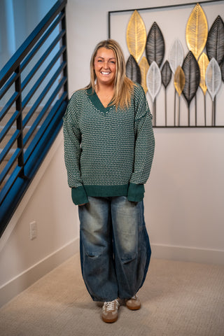 Green contrast knit V-neck sweater with speckled pattern and ribbed cuffs