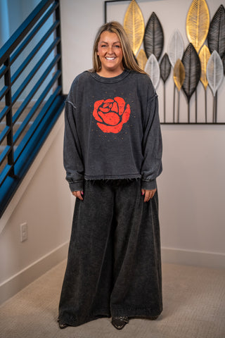 Washed charcoal cropped sweatshirt with bold red rose graphic and gold stud embellishments