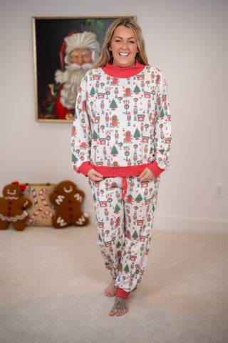 Rareraw nutcracker print Christmas PJ set in cream, red and green