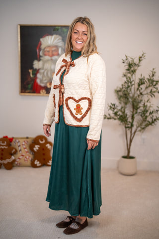Cream quilted jacket with gingerbread heart pocket and plaid bow ties