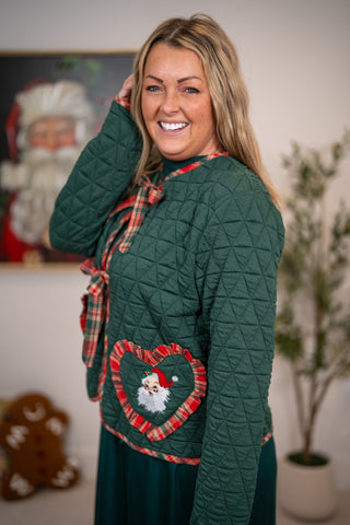 Green quilted jacket with plaid trim and heart-shaped Santa Claus pocket