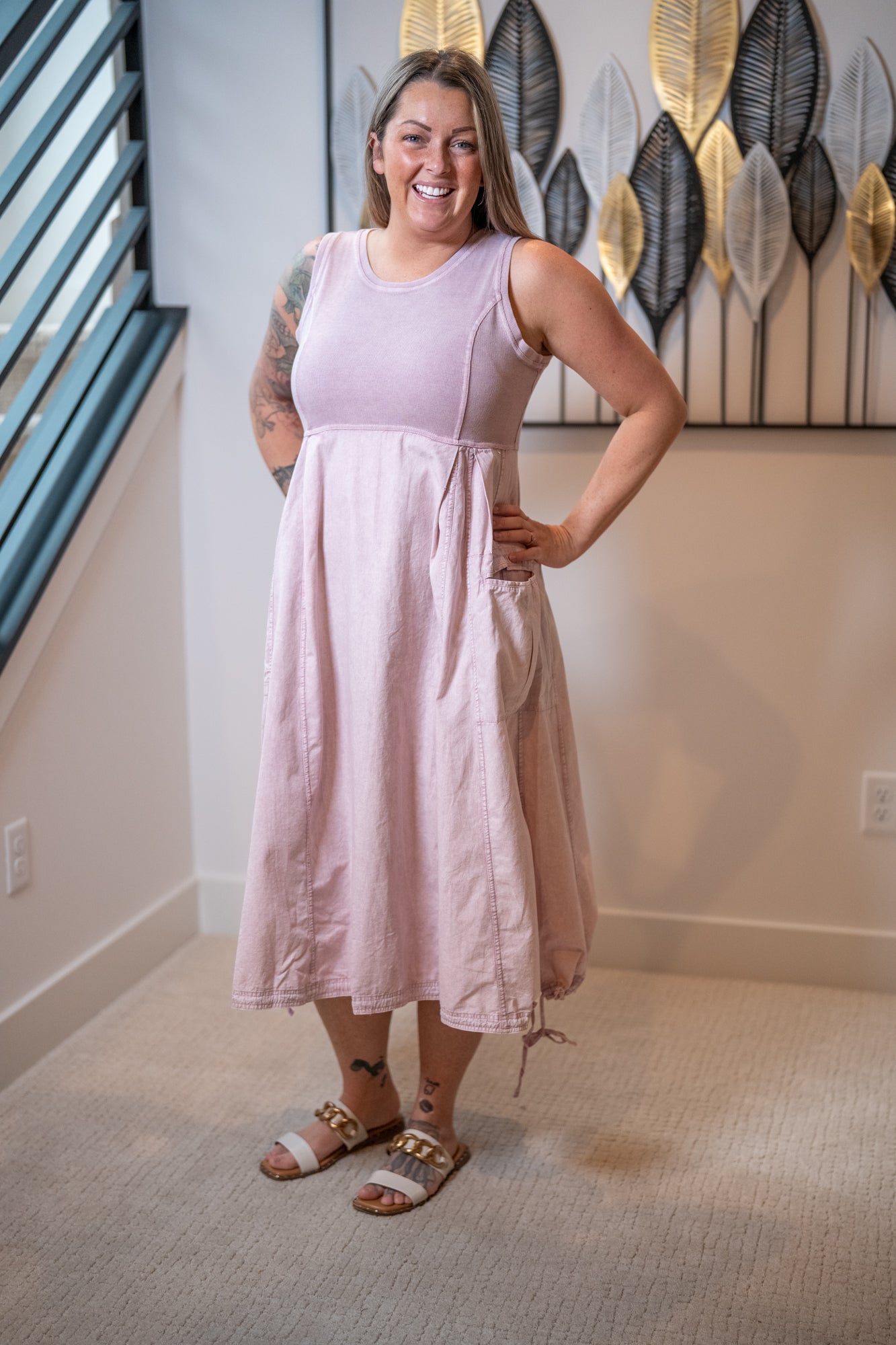Model wearing Easel mauve mineral wash sleeveless cargo maxi dress with side pockets