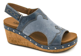 Blue leather wedge sandal with cork platform, metal studs, and adjustable slingback strap