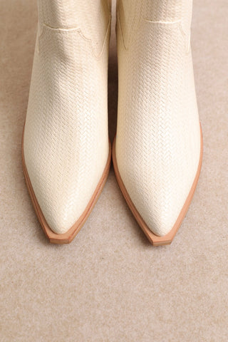 Cream woven textured pointed-toe western ankle booties with tan sole