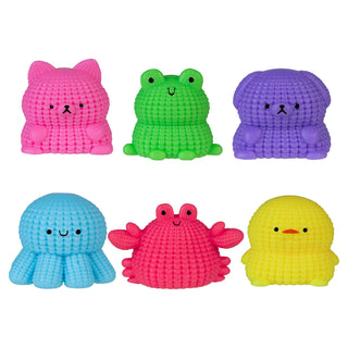 Set of colorful soft toy figures on a white background